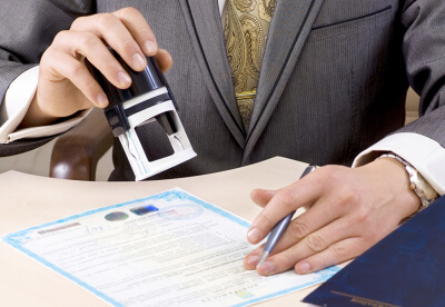 Assisting a client in obtaining required permits and certifications for production of food products and beverages;